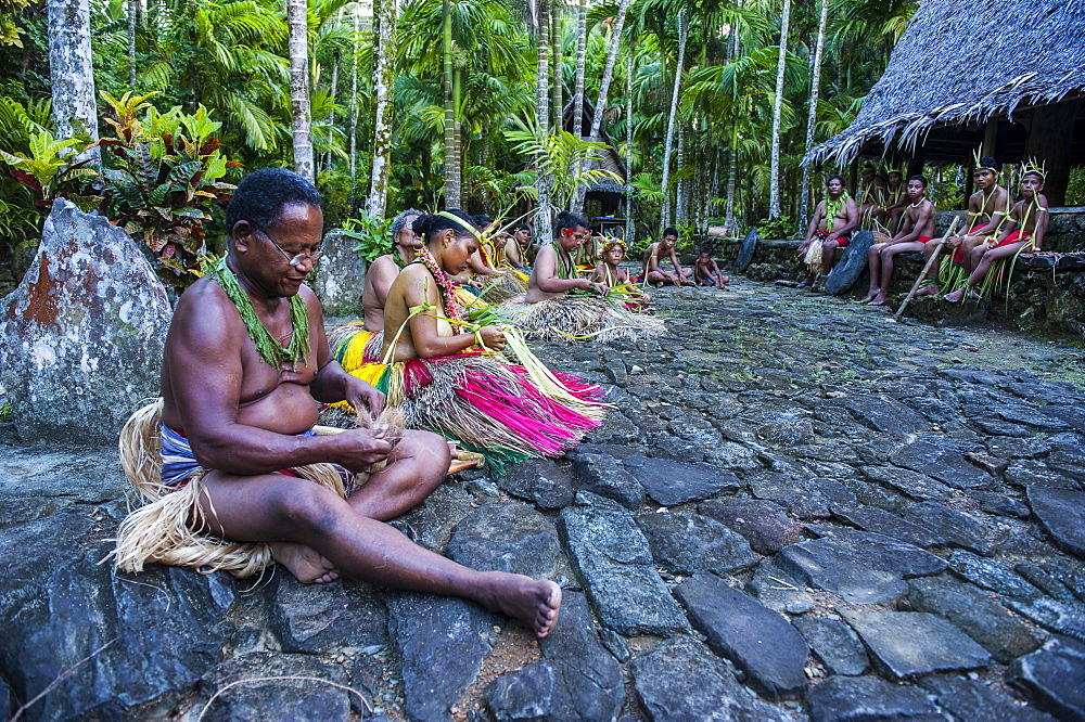 Traditionally dressed islanders making traditional art work, Yap Island, Caroline Islands, Micronesia, Oceania