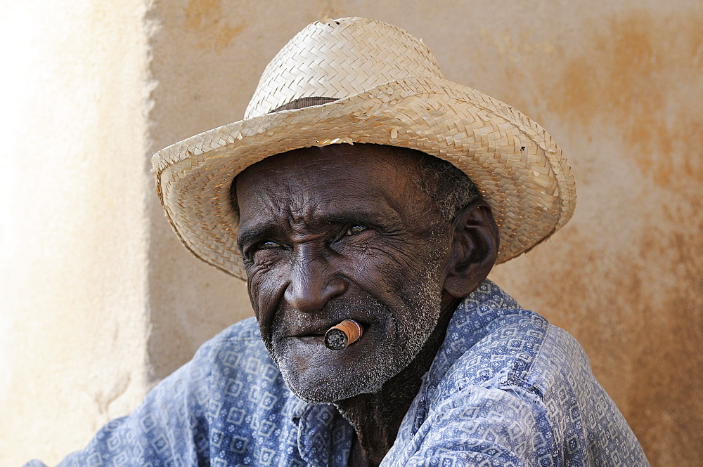 Man with cigar and straw hat, Trinidad, Sancti Spiritus Province, Cuba, Central America