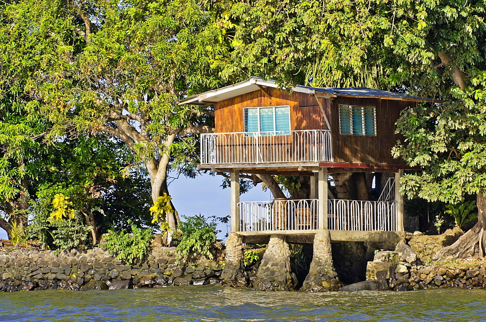 Wooden house on a small island with tropical vegetation in Lake Nicaragua, Isletas, Lago de Nicaragua, Nicaragua, Central America