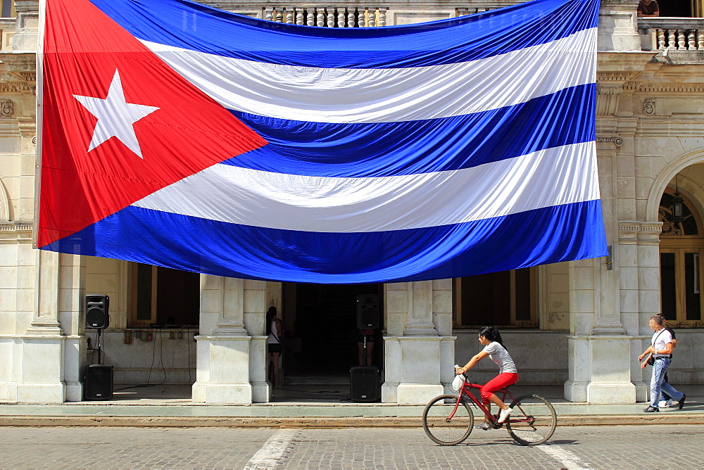 Large Cuban flag, hangs from building, Santa Clara, Cuba, Central America