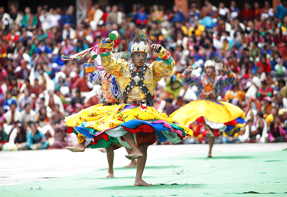 Dancers and spectators at the Tashichho Dzong monastery festival, Thimphu, Bhutan, Asia