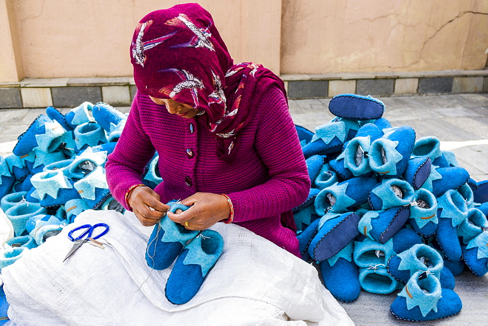 Woman working on felt shoes, Kathmandu, Kathmandu, Nepal, Asia