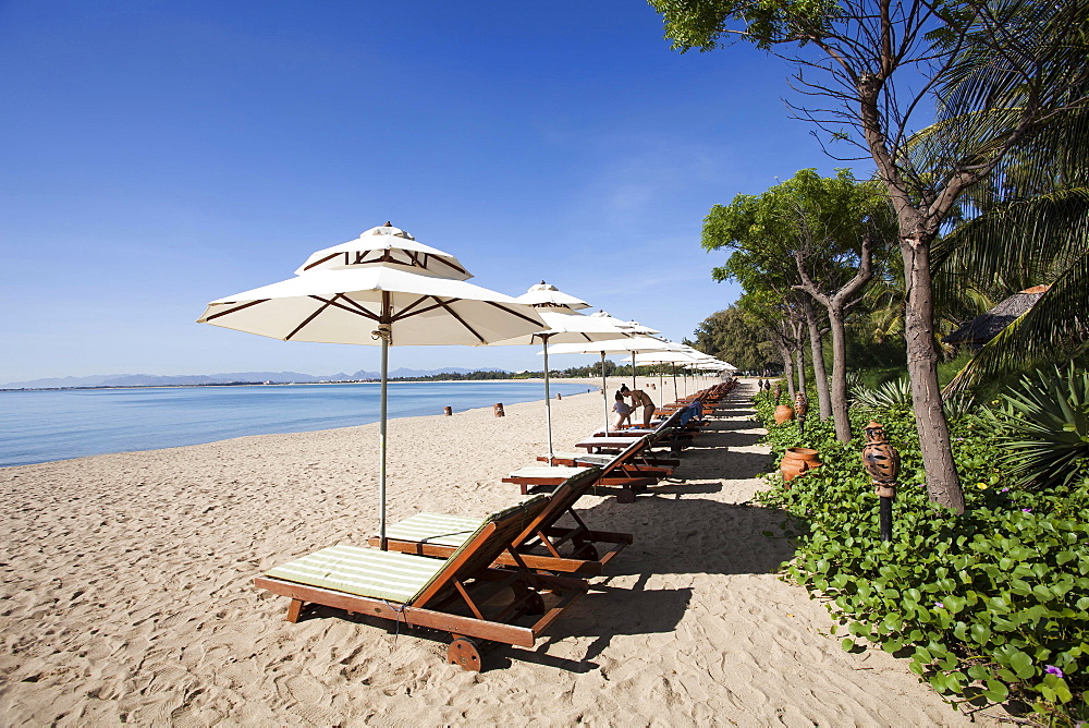 Beach with sun beds of the Saigon Ninh Chu Resort on the beach of Phan Rang, Ninh Thuan, Vietnam, Asia