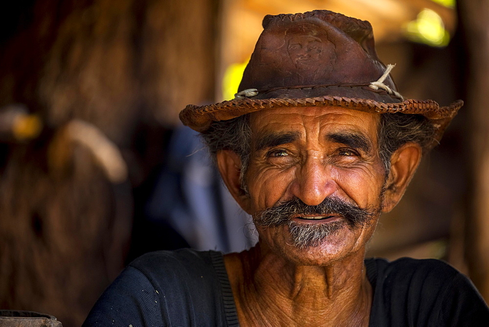 Sugar cane farmer wearing a hat, portrait, Valle de los Ingenios, Trinidad, Sancti Spiritus Province, Cuba, Central America