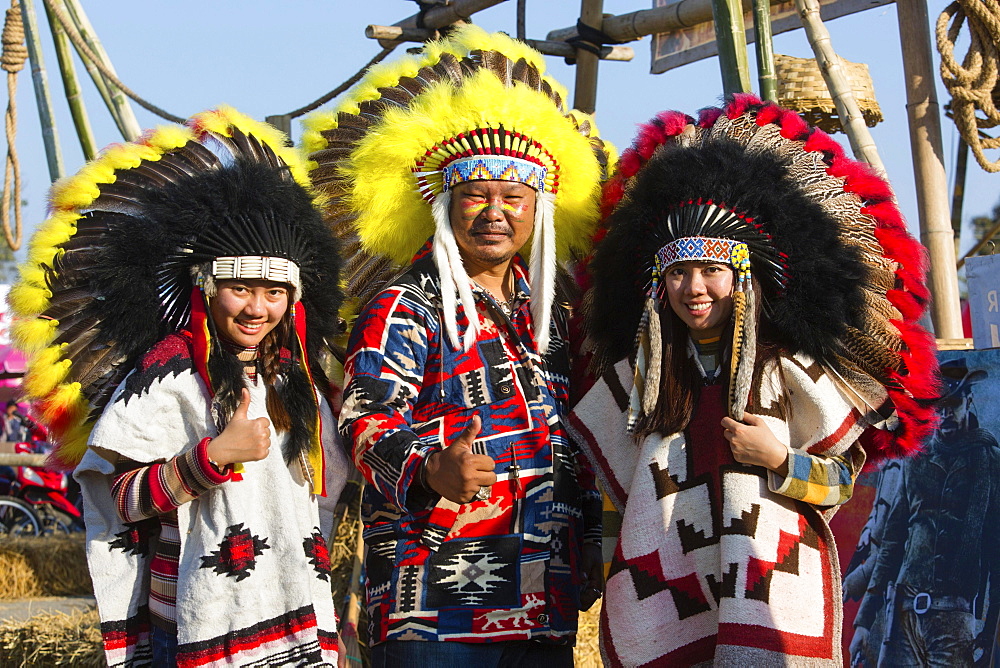 Three Asian with Indian jewelry at a festival with headdress, Chiang Rai Festival, Chiang Rai Province, Northern Thailand, Thailand, Asia