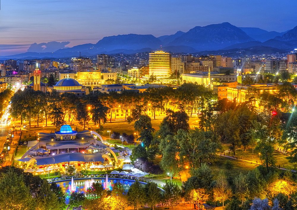 Rinia-Park and city centre, view from Sky Tower, back surroundings with mountains, dusk, Tirana, Albania, Europe