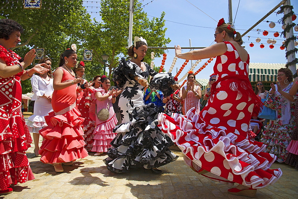 Flamenco dancers at the Feria de Abril, Seville, Andalucia, Spain, Europe