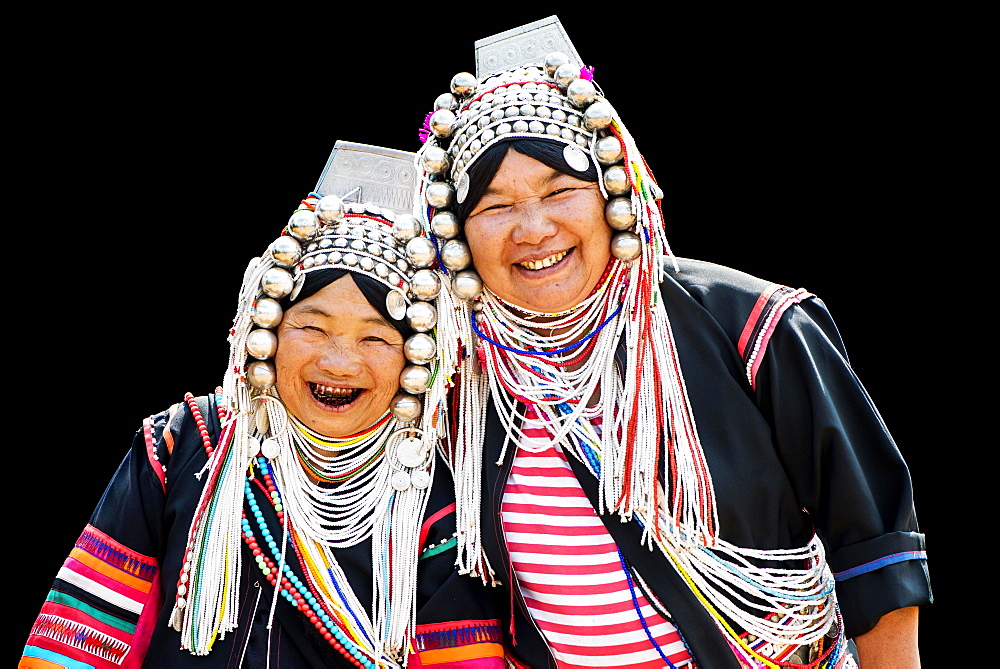 Akha hill tribe women in traditional dress, northern Thailand