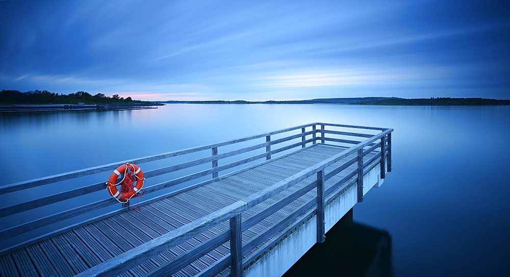 Pier in the harbour with life belt, dusk, lake Geiseltalsee, Braunsbedra, Saxony-Anhalt, Germany, Europe