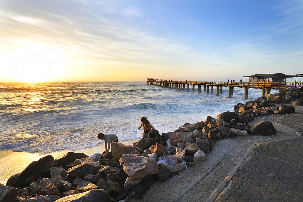 Sunset on the 325 meter long wooden jetty in Swakopmund, Namibia, Africa