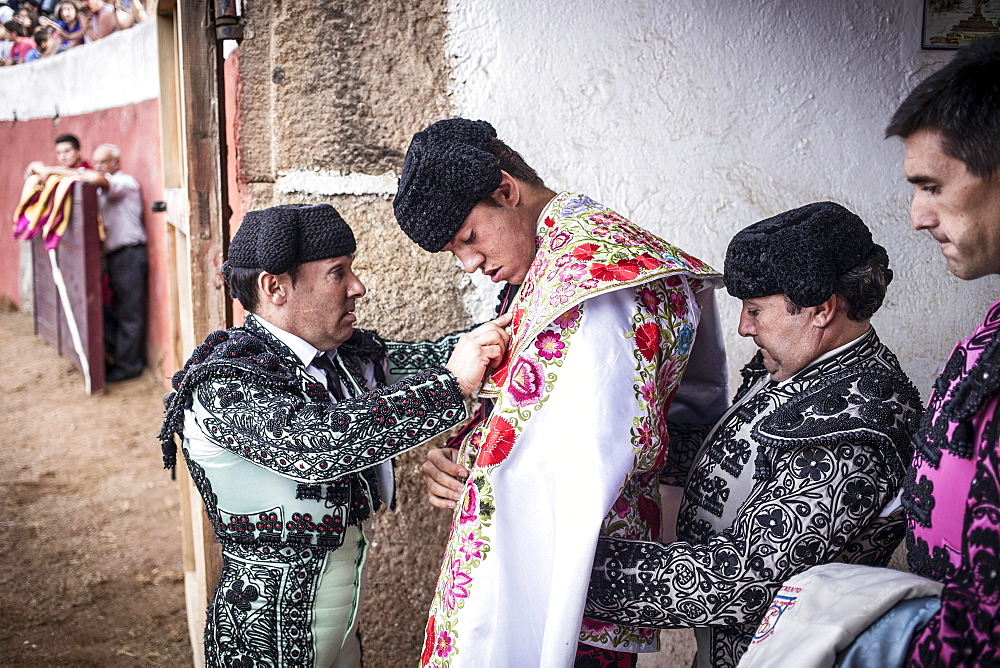 Novillero, young fighter, being dressed before a bullfight, Barco de Avila, Avila, Castile and Leon, Spain, Europe