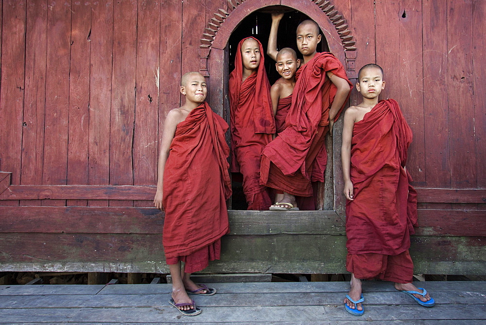 Novice monks in the Shwe Yaunghwe Kyaung Monastery, near Nyaungshwe, Shan State, Inle Lake, Myanmar, Asia