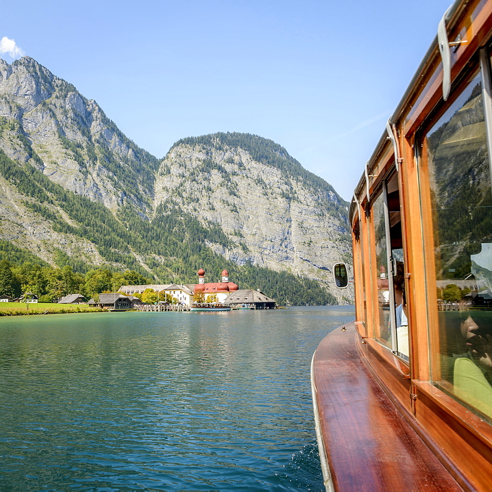 View from a passenger boat on Lake Konigsee, in the back boat landing stage St. Bartholoma and Watzmann massif, mountain landscape, Berchtesgaden National Park, Berchtesgadener Land, Upper Bavaria, Bavaria, Germany, Europe