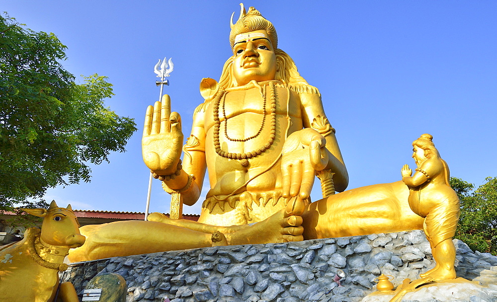 Golden Shiva statue in Hindu Shiva temple Koneswaram, Trincomalee, Eastern Province, Sri Lanka, Asia