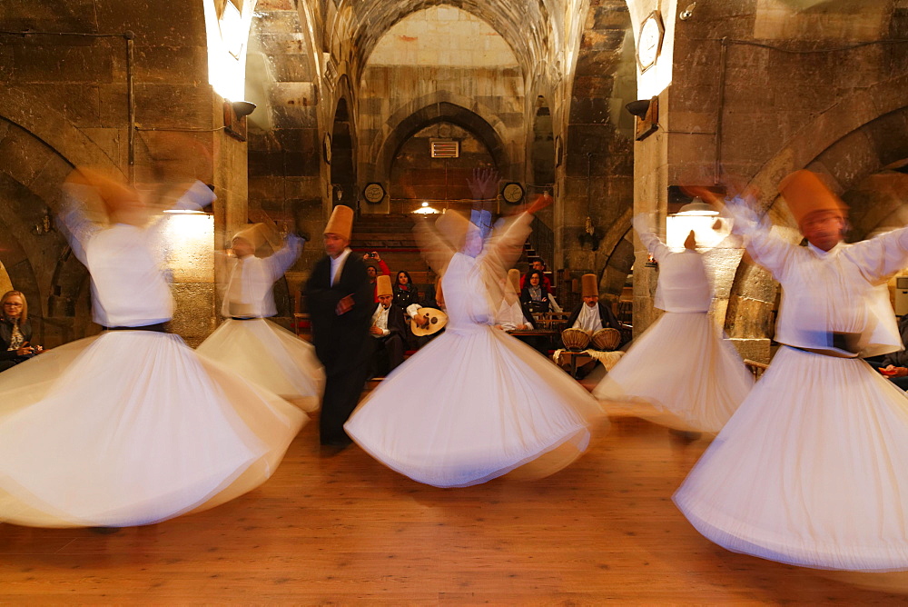 Whirling Dervishes of the Mevlevi Order, Sema ceremony, Saruhan Caravanserai, Sarihan, near Avanos, Cappadocia, Central Anatolia Region, Anatolia, Turkey, Asia