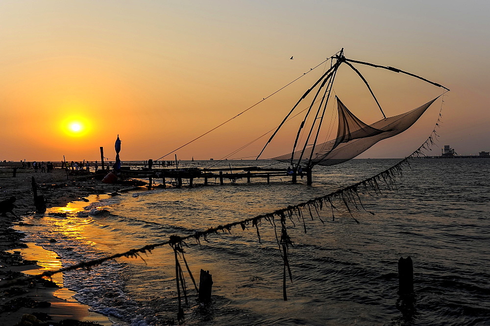 Chinese fishing nets at sunset, Kochi, Kerala, South India, India, Asia