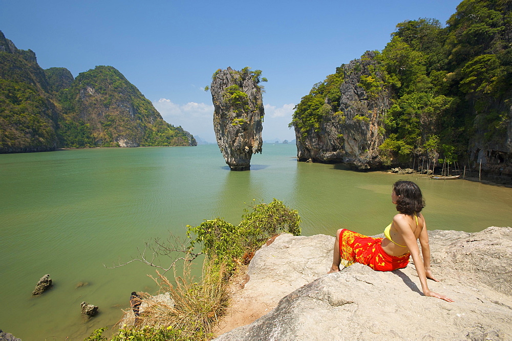 Woman with a view of Khao Phing Kan or James Bond Island, Krabi, Thailand, Asia