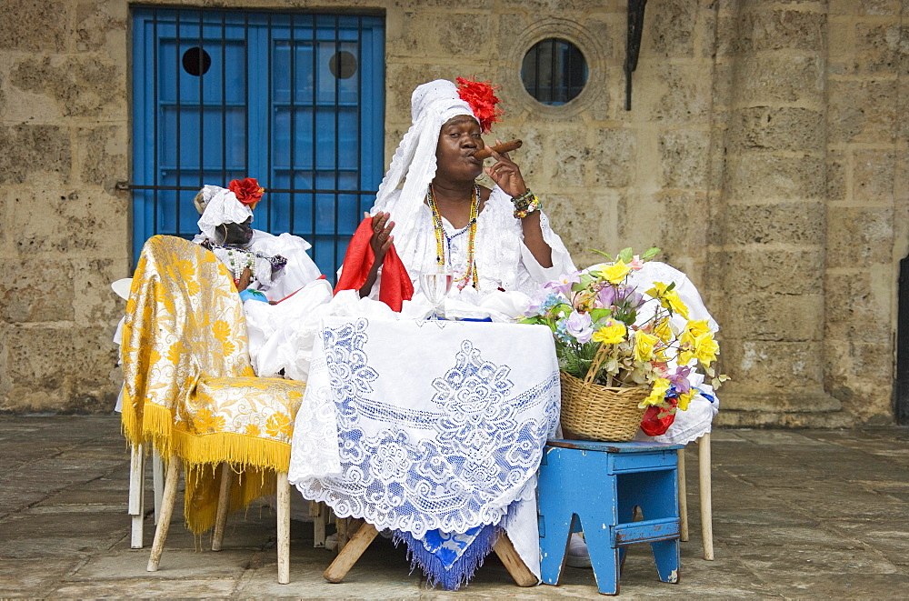 Fortune teller posing with a cigar, Havana, Cuba, Central America