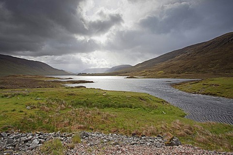 Looking east along Loch Cluanie, in the Scottish Highlands from the head where the River Cluanie enters, Scotland, United Kingdom, Europe