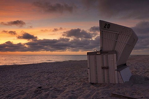 Roofed wicker beach chairs on the beach just after sunset, Hoernum, Sylt island, North Friesland district, Schleswig-Holstein, Germany, Europe