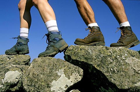 Hikers' legs, walking in the Massif of Sancy, Puy de Dome, Auvergne, France, Europe