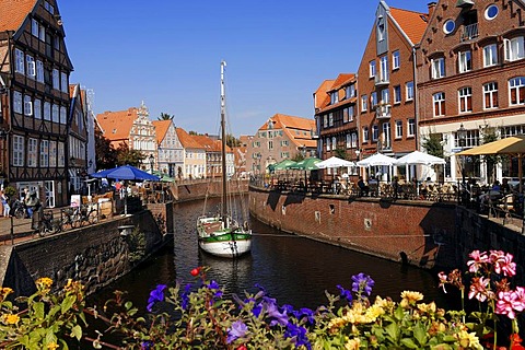 Ship in the old harbour and outdoor cafes, Stade, Lower Saxony, Germany, Europe