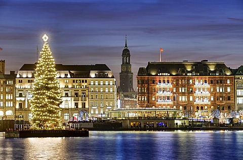 Binnenalster or Inner Alster Lake at Christmas time with Alster fir tree and Church of St. Michael, Michaeliskirche, Michel, Hamburg, Germany, Europe