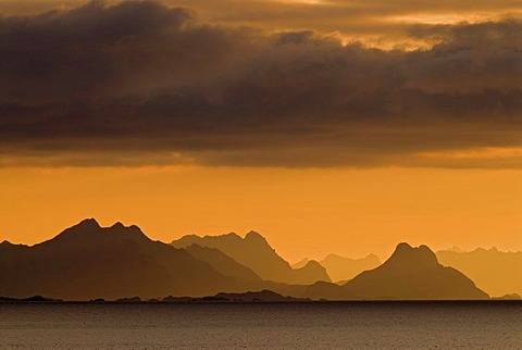 The silhouette of the Lofoten Wall, the mountains of the Lofoten islands, as seen from near Reine, island of Moskenesoy, Moskenesoy, Lofoten archipelago, Nordland, Norway, Europe