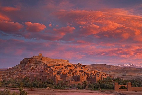 A spectacular sunrise above the Ksar, fortified city, of Ait Ben Haddou, UNESCO World Heritage Site, and the Ounila River on the eastern slope of the High Atlas mountains, Souss-Massa-Draa, Morocco, Africa