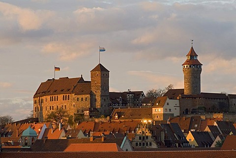 The Imperial Castle (Kaiserburg) of Nuremberg illuminated by warm evening light, Nuremberg, Middle Franconia, Bavaria, Germany, Europe