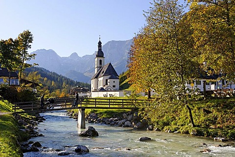 Parish Church of St. Sebastian and Ramsauer Ache River in front of the Reiteralpe mountains, Berchtesgadener Land, Upper Bavaria, Germany, Europe