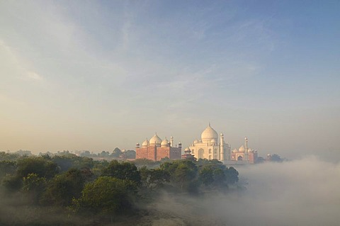 Taj Mahal, UNESCO World Heritage Site, arising out of the morning fog over river Yamuna, Agra, Uttar Pradesh, India, Asia