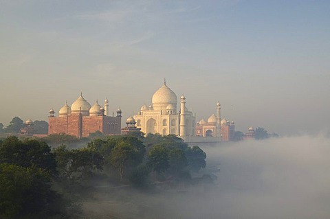 Taj Mahal, UNESCO World Heritage Site, arising out of the morning fog over river Yamuna, Agra, Uttar Pradesh, India, Asia