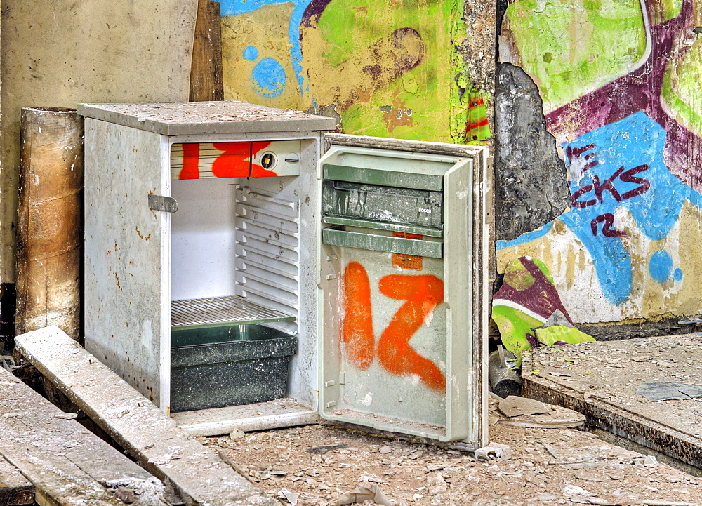 Refrigerator, graffiti, abandoned factory