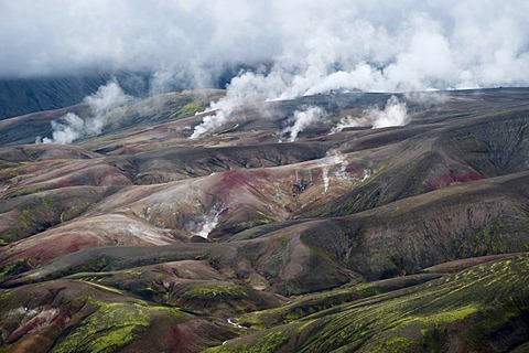 Hot springs emerging from the colourful volcanic landscape near Reykjadalir and Hrafntinnusker, first and second day's stage of the popular hiking trail of Laugavegur, Iceland, Europe