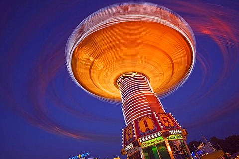 Chair swing ride or Chair-O-Planes at night, Oktoberfest, Munich, Bavaria, Germany, Europe