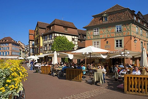 Half-timbered houses and restaurants on a canal in the Quartier des Tanneurs, tanners' quarter, historic centre of Colmar, Alsace, France, Europe