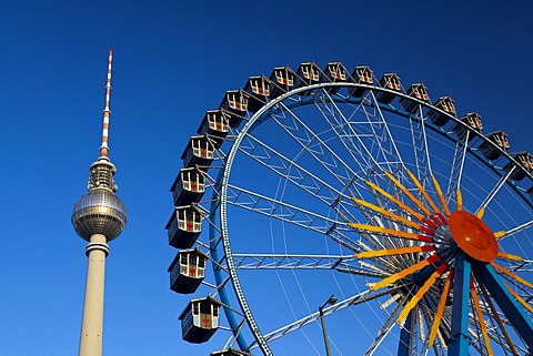 Fernsehturm television tower and Ferris wheel against a blue sky, Berlin, Germany, Europe, PublicGround