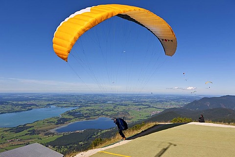 Hang glider taking off, Mt Tegelberg, Froggensee Lake at back, Upper Bavaria, Bavaria, Germany, Europe, PublicGround