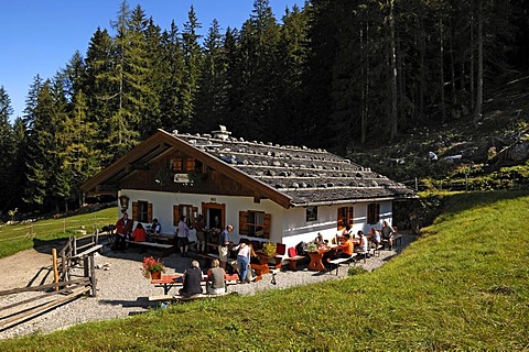 Mordaualm, altitude 1200m, with hikers, mountain pasture with inn, Ramsau, Upper Bavaria, Bavaria, Germany, Europe