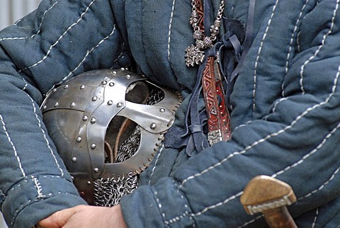 Helmet under a Viking 's arm, Viking festival, Hafnarfjoerï£¿ur, West Iceland, Iceland, Europe