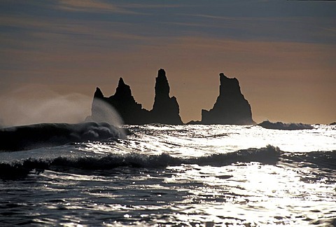 Reynisdrangar group of rocks near Vik i MËrdal with Skessudrangur, Laddrangur and Langhamar rock formations, according to legend, three petrified trolls, south coast, Iceland, Europe