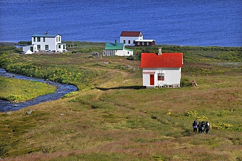 Group of hikers near Hesteyri, Hesteyrarfjoerï£¿ur or Joekulfirï£¿ir, Hornstrandir hiking paradise, Westfjords, Iceland, Europe