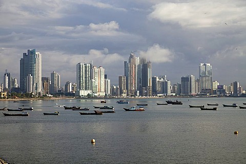 Fishing boats against the skyline of Panama City, Panama, Central America