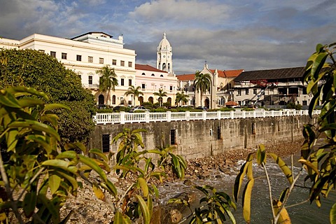 Bell tower of the Iglesia de San Francisco Church and the building of the national theatre, Teatro Nacional, in the Old City, Casco Viejo, Panama City, Panama, Central America