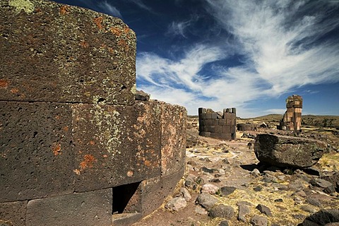 Burial towers called chullpas, of the Aymara people from the Colla culture above Lake Umayo near Puno, conquered by the Incas in the 15th Century and reused, Puno, Peru, South America