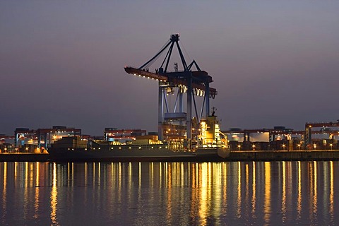 Container ship is loaded at dusk, Altenwerder Container Terminal, Port of Hamburg, Hamburg, Germany, Europe