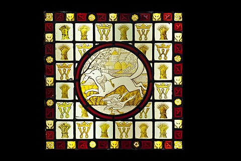 Stained glass roundel surrounded by quarries, depicting a fox and a goose, a scene from Reynard and the fox, designed and made by Clement James Heaton between about 1845-1855, Stained Glass Museum in Ely Cathedral, Ely, England, United Kingdom, Europe