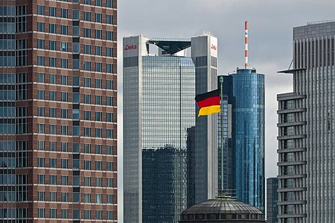 German flag flying on the dome of Festhalle Frankfurt, festival hall, Frankfurt trade fair grounds, in front of skyscrapers, Frankfurt am Main, Hesse, Germany, Europe