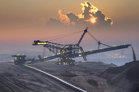 Spreaders in an open-cast lignite mine in the early morning, Garzweiler, North Rhine-Westphalia, Germany, Europe